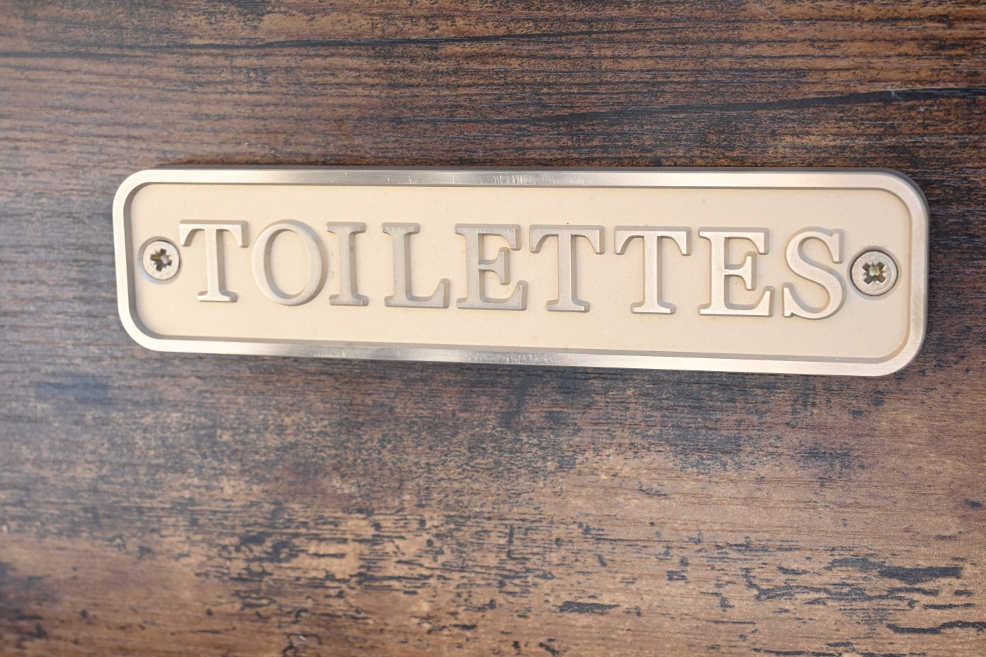 Placa Latón Toilettes